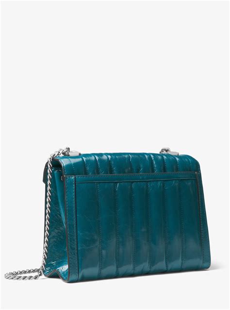 whitney large quilted shoulder bag.